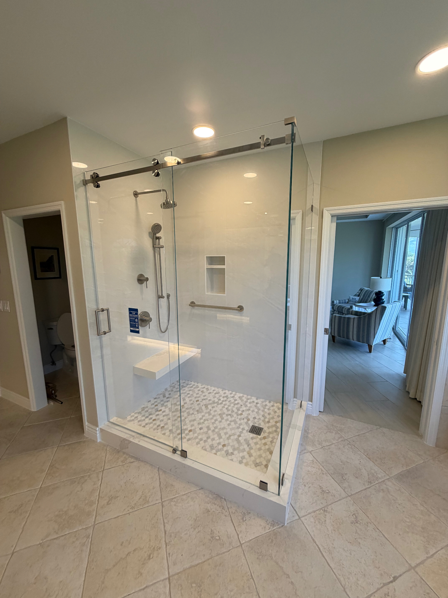 Frameless corner shower enclosure with sliding door — Naples install